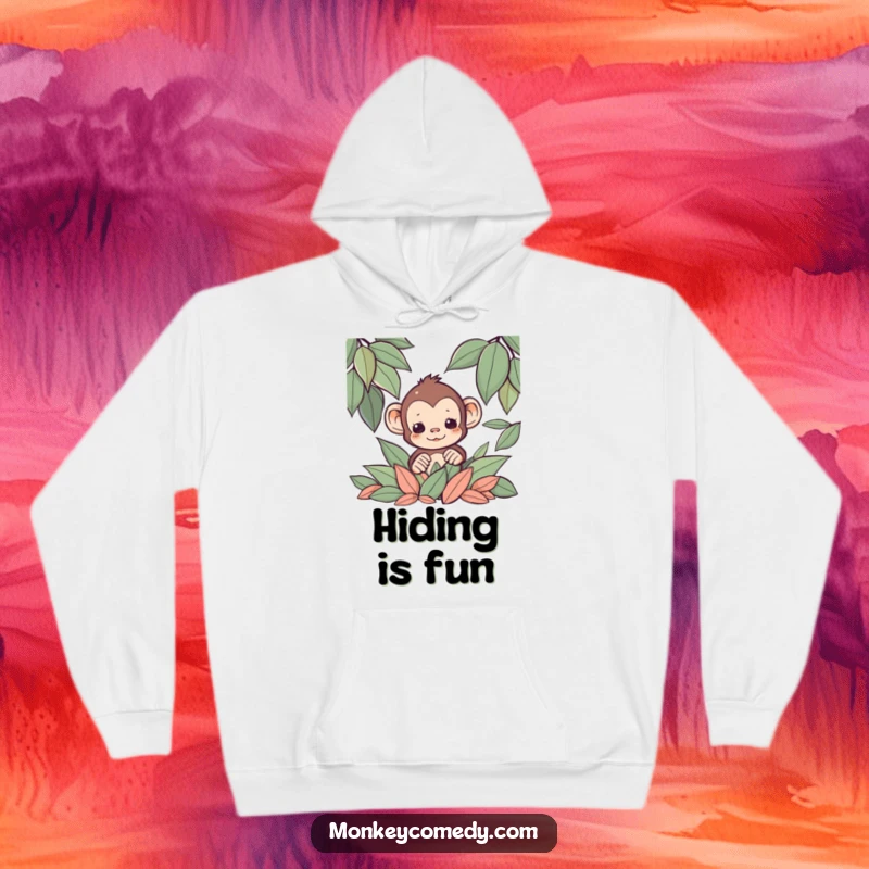 Funny Kawaii monkey peeking from a pile of leaves on a soft hoodie, perfect for cool weather.