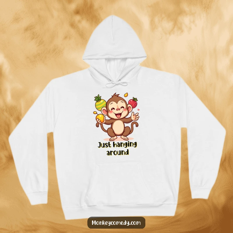 Funny Kawaii Monkey Juggling Colorful Fruits Hoodie, a cute monkey expertly juggling a rainbow of fruits, offering warmth and hilarious style.