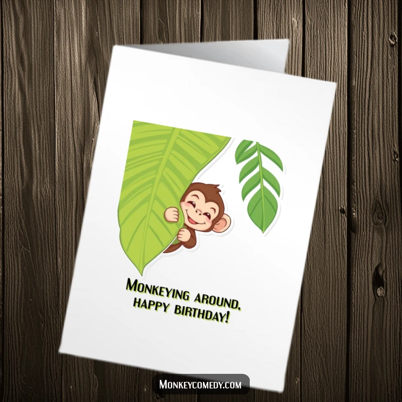 Funny Free Printable Birthday Card: Monkey peeking from behind a leaf, winking playfully, adding jungle mischief to wishes, downloadable.