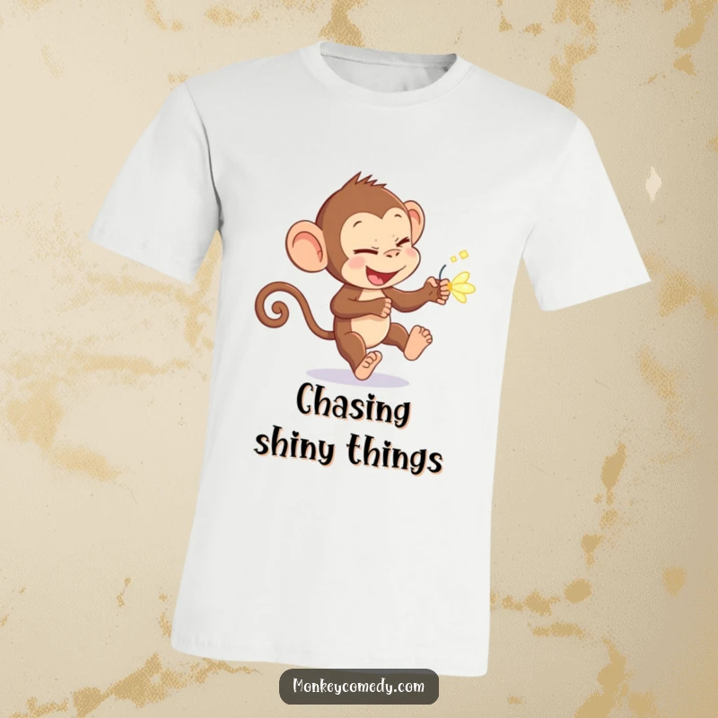 Funny monkey with a glint in its eye, chasing a bright firefly, a hilarious tee for a funny gift.
