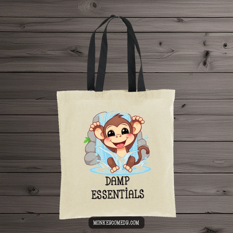 Funny tote bag featuring a smiling monkey playfully splashing waterfall water, ideal for carrying essentials with a touch of watery cheer.